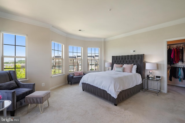 500 Overlook Park Drive 27, Oxon Hill, MD 20745 - bedroom featuring carpet flooring, a walk in closet, crown molding, and a closet