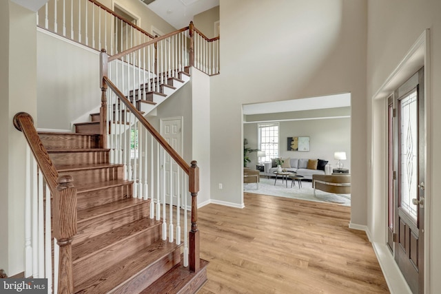 13336 Braddock Rd, Clifton, VA 20124 - foyer featuring light wood-style floors, stairway, and a high ceiling
