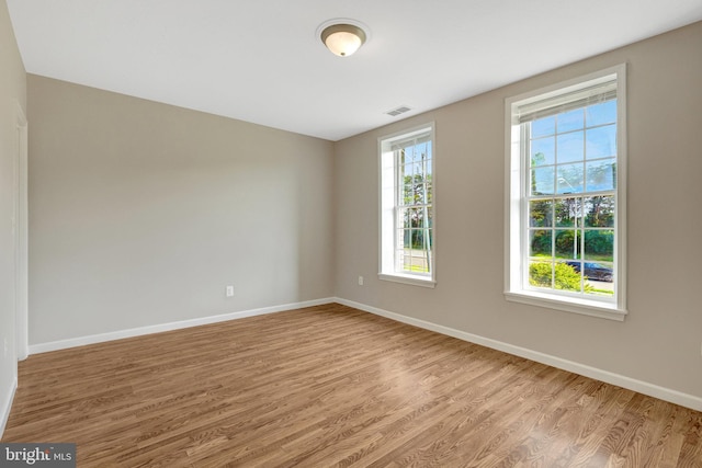 13336 Braddock Rd, Clifton, VA 20124 - empty room with wood finished floors and baseboards