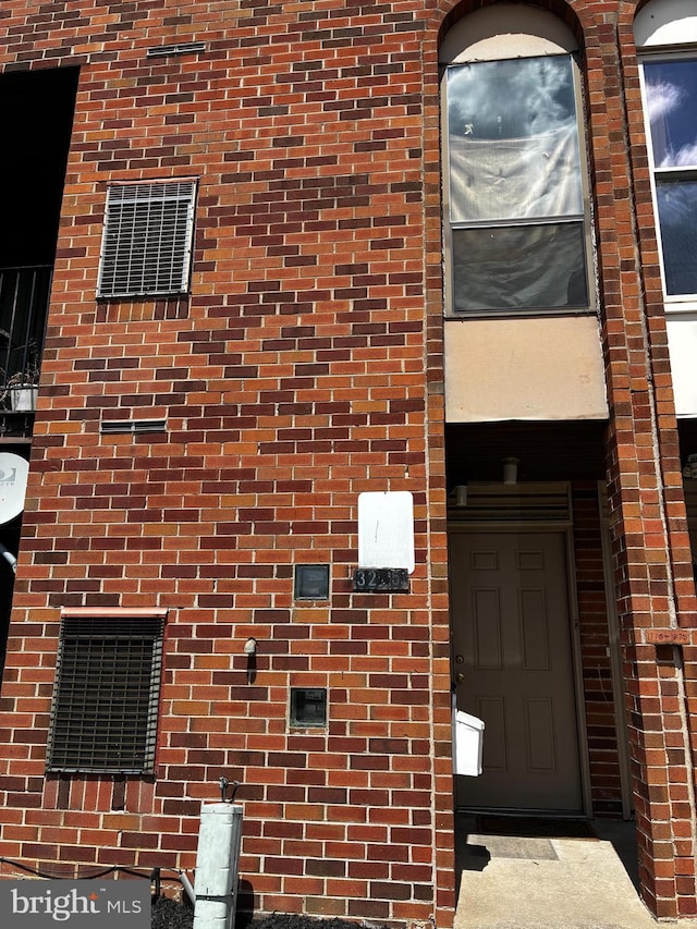 3205 Red Lion Rd, Philadelphia, PA 19114 - doorway to property with brick siding