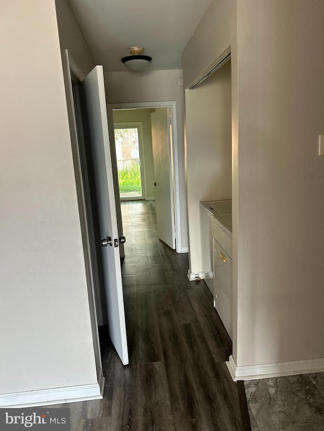 3205 Red Lion Rd, Philadelphia, PA 19114 - hallway with washer and dryer and dark wood finished floors