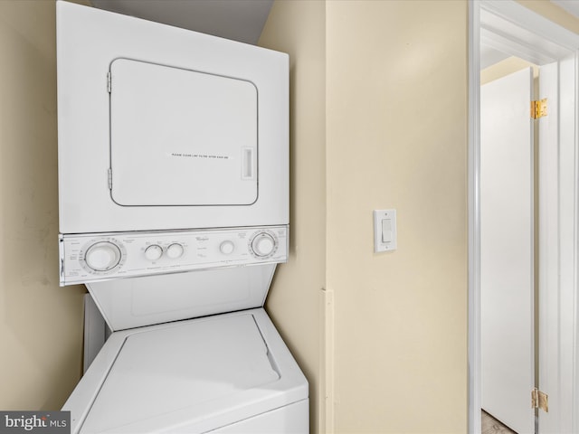 10900 Coastal Hwy Unit 814Golden, Sands, Ocean City, MD 21842 - laundry room featuring stacked washer / dryer