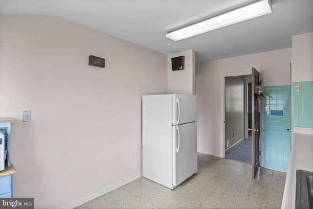 64 Warwick Rd, Stratford, NJ 08084 - kitchen featuring freestanding refrigerator and light floors