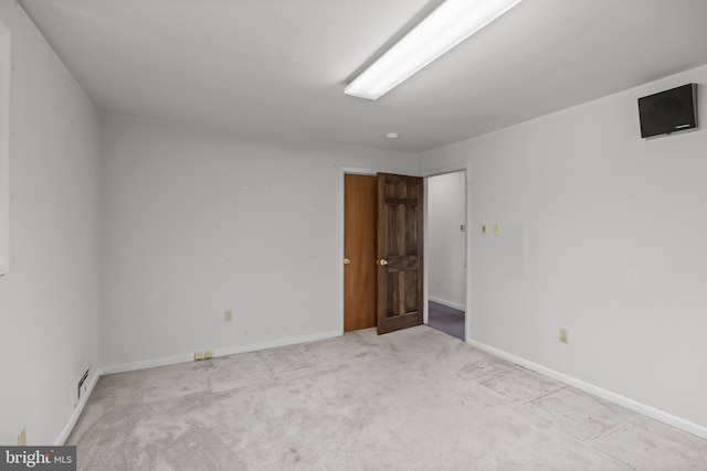 64 Warwick Rd, Stratford, NJ 08084 - carpeted spare room with baseboards