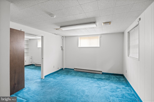64 Warwick Rd, Stratford, NJ 08084 - below grade area featuring a baseboard radiator and carpet