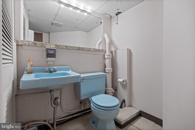 64 Warwick Rd, Stratford, NJ 08084 - half bathroom with toilet and a paneled ceiling