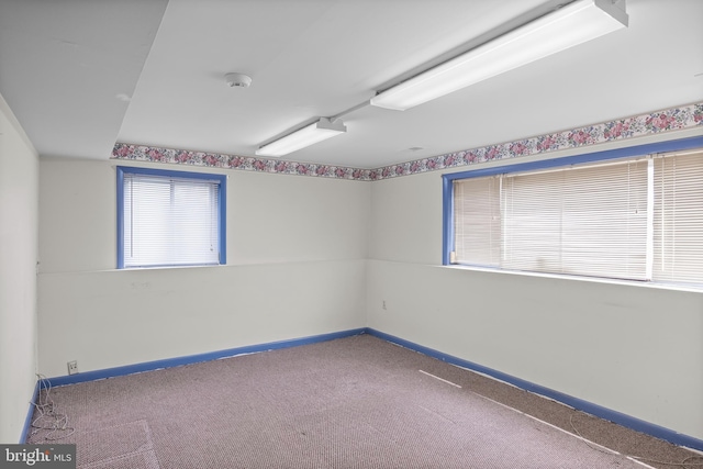 64 Warwick Rd, Stratford, NJ 08084 - spare room with a smoke detector and carpet flooring