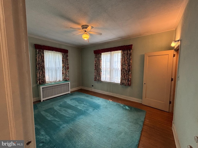 400 E Main St, Ephrata, PA 17522 - spare room with radiator heating unit, wood finished floors, healthy amount of natural light, a textured ceiling, and crown molding