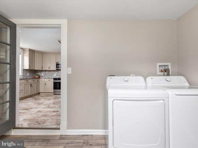 232 Crawford St, Strasburg, VA 22657 - laundry room with separate washer and dryer and light wood finished floors