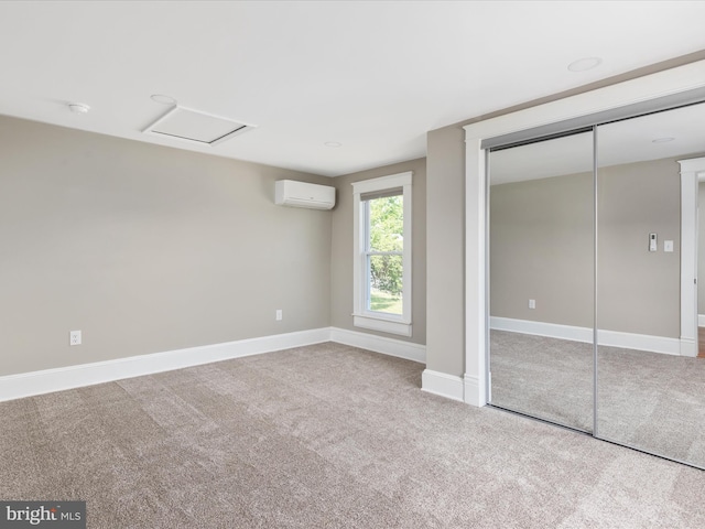 232 Crawford St, Strasburg, VA 22657 - unfurnished bedroom featuring carpet flooring, a wall mounted air conditioner, a closet, and attic access