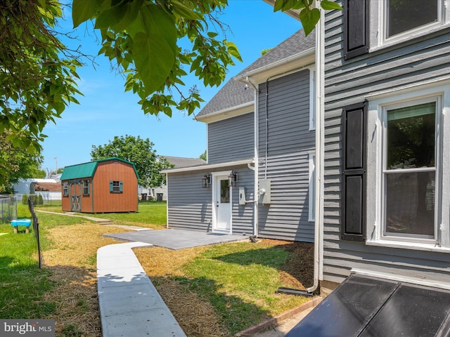 232 Crawford St, Strasburg, VA 22657 - view of green lawn with a shed