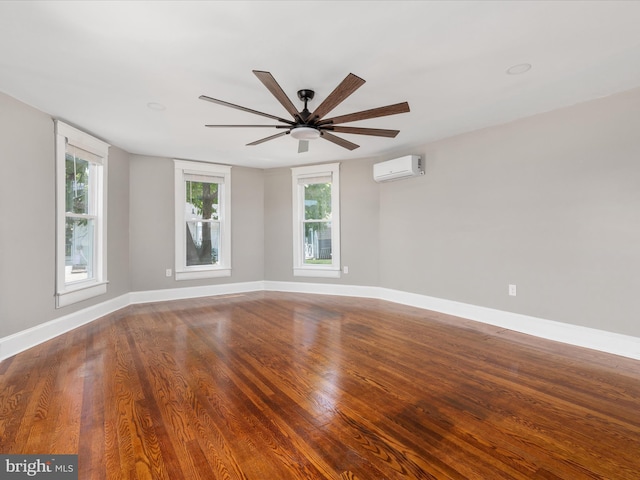 232 Crawford St, Strasburg, VA 22657 - unfurnished room with a wall mounted air conditioner, ceiling fan, wood finished floors, and plenty of natural light