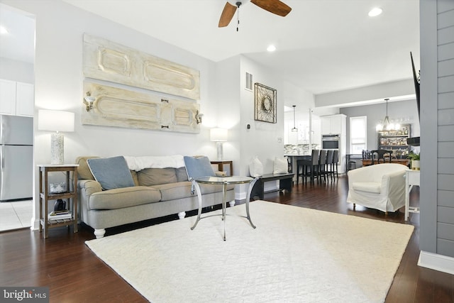 110 S Washington St, Havre De Grace, MD 21078 - living room featuring dark wood finished floors, a chandelier, ceiling fan, and recessed lighting