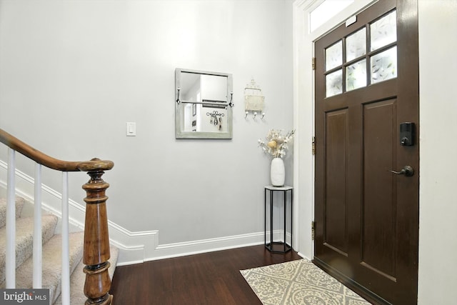110 S Washington St, Havre De Grace, MD 21078 - foyer entrance with dark wood-type flooring and stairway