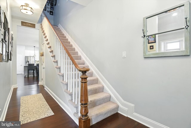 110 S Washington St, Havre De Grace, MD 21078 - staircase featuring wood finished floors