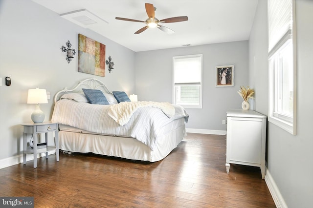 110 S Washington St, Havre De Grace, MD 21078 - bedroom with multiple windows, wood finished floors, and ceiling fan