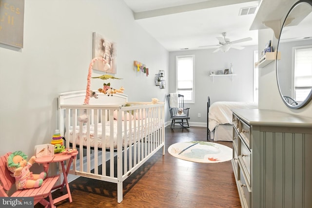 110 S Washington St, Havre De Grace, MD 21078 - bedroom featuring wood finished floors and a nursery area