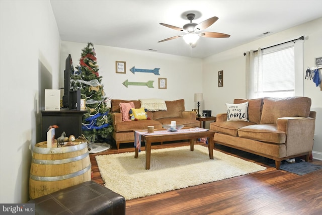 110 S Washington St, Havre De Grace, MD 21078 - living area featuring a ceiling fan and wood finished floors