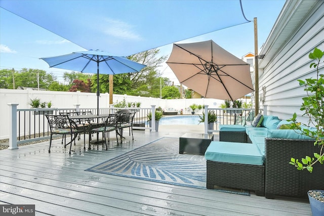 110 S Washington St, Havre De Grace, MD 21078 - wooden deck featuring outdoor dining area, a fenced backyard, and outdoor lounge area