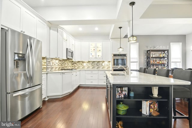 110 S Washington St, Havre De Grace, MD 21078 - kitchen with appliances with stainless steel finishes, open shelves, tasteful backsplash, white cabinets, and recessed lighting