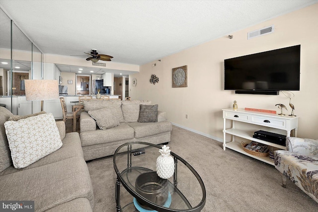9800 Coastal Hwy Unit 1207, Ocean City, MD 21842 - living area with carpet flooring and ceiling fan