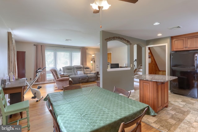 1002 S 2nd Ave, Lebanon, PA 17042 - dining room featuring ceiling fan, stairway, arched walkways, and recessed lighting