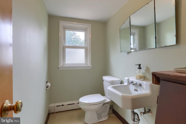 1002 S 2nd Ave, Lebanon, PA 17042 - bathroom featuring a baseboard heating unit and tile patterned flooring