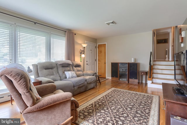 1002 S 2nd Ave, Lebanon, PA 17042 - living room with wood finished floors and stairway