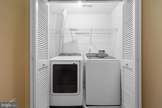 8078 Horseshoe Cottage Cir, Lorton, VA 22079 - laundry area featuring separate washer and dryer