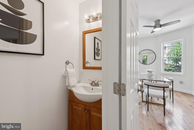 643 Keefer Pl NW, Washington, DC 20010 - bathroom featuring vanity, wood-type flooring, and a ceiling fan