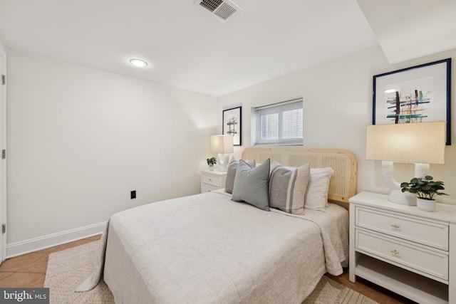 643 Keefer Pl NW, Washington, DC 20010 - bedroom featuring baseboards and light tile patterned floors
