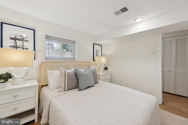 643 Keefer Pl NW, Washington, DC 20010 - bedroom featuring tile patterned floors and a closet