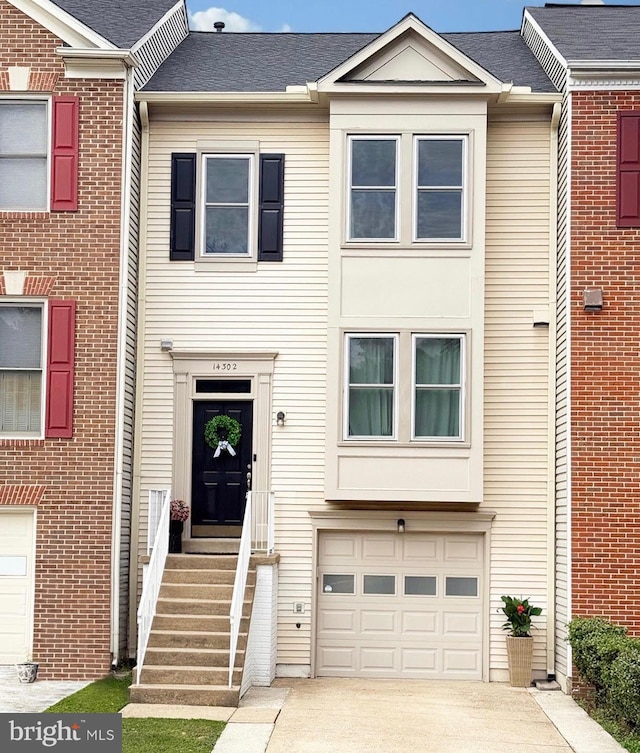 14302 Silo Valley Vw, Centreville, VA 20121 - view of property with an attached garage and driveway