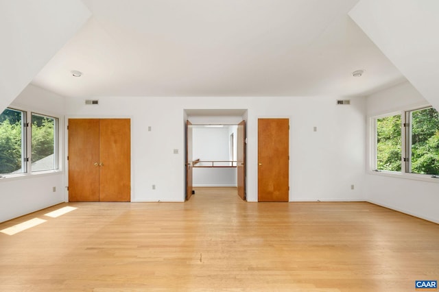 906 Old Farm Rd, Charlottesville, VA 22903 - unfurnished living room with light wood-style flooring and baseboards