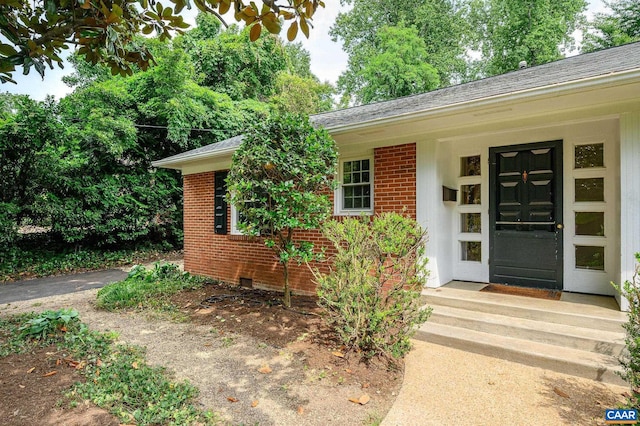 906 Old Farm Rd, Charlottesville, VA 22903 - doorway to property featuring brick siding and a shingled roof