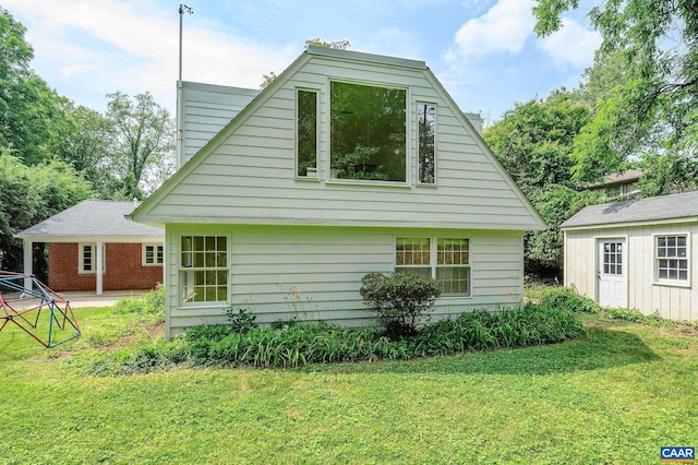 906 Old Farm Rd, Charlottesville, VA 22903 - rear view of house featuring a lawn and an outdoor structure