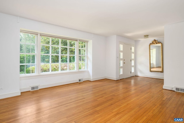 906 Old Farm Rd, Charlottesville, VA 22903 - unfurnished living room featuring light wood-style floors and baseboards