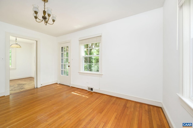 906 Old Farm Rd, Charlottesville, VA 22903 - unfurnished room featuring a chandelier and light wood-style flooring