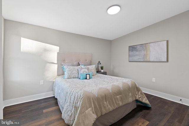 1510 Ramsay St, Baltimore, MD 21223 - bedroom with wood finished floors and vaulted ceiling