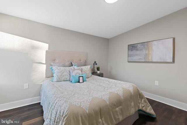 1510 Ramsay St, Baltimore, MD 21223 - bedroom with wood finished floors and vaulted ceiling