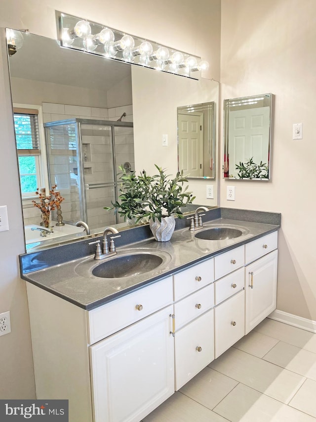 2510 Heatherwood Ct, Hyattsville, MD 20783 - bathroom with double vanity, a shower stall, and tile patterned floors