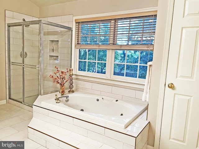 2510 Heatherwood Ct, Hyattsville, MD 20783 - full bathroom featuring a jetted tub, a shower stall, and healthy amount of natural light