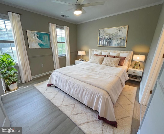 2510 Heatherwood Ct, Hyattsville, MD 20783 - bedroom featuring wood finished floors, crown molding, and ceiling fan