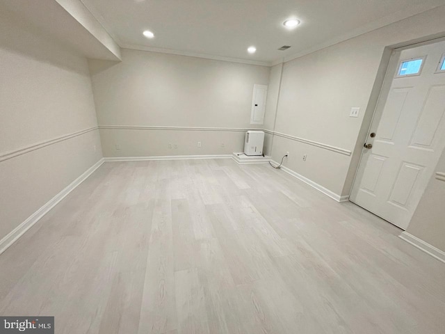 2510 Heatherwood Ct, Hyattsville, MD 20783 - below grade area with recessed lighting, light wood-type flooring, ornamental molding, and electric panel