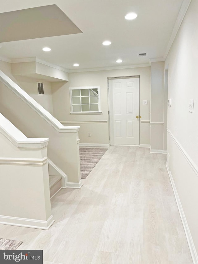 2510 Heatherwood Ct, Hyattsville, MD 20783 - foyer entrance featuring crown molding, light wood-style floors, recessed lighting, and stairway