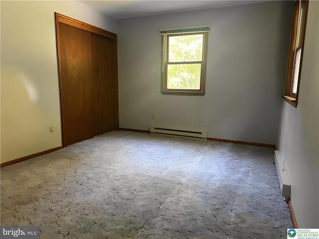 93 Sassafras, Lehighton, PA 18235 - unfurnished bedroom featuring a baseboard radiator, carpet flooring, and a closet