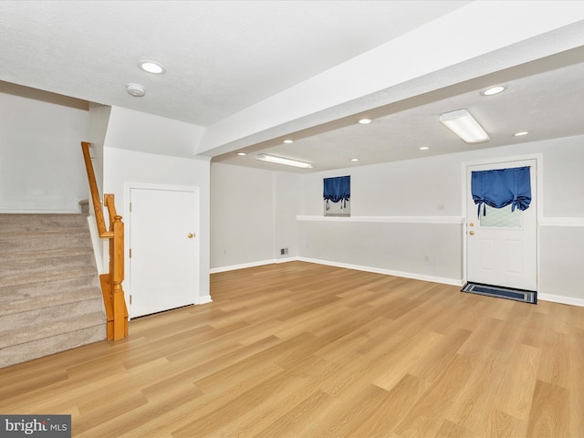 5220 Earles Ct, Frederick, MD 21703 - finished below grade area featuring light wood-type flooring, stairs, and recessed lighting