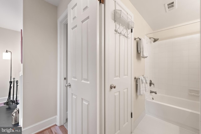 317 10th St NE Unit 13, Washington, DC 20002 - full bathroom featuring shower / bathtub combination and baseboards
