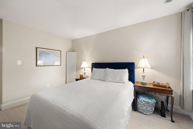 317 10th St NE Unit 13, Washington, DC 20002 - carpeted bedroom with baseboards