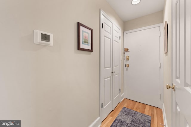 317 10th St NE Unit 13, Washington, DC 20002 - doorway to outside featuring light wood-type flooring